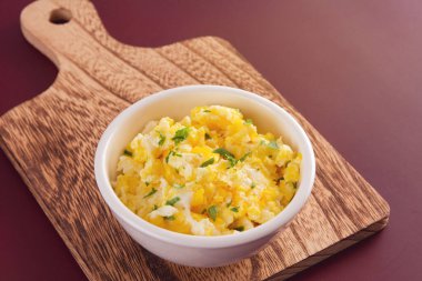 Fresh scrambled eggs with parsley
