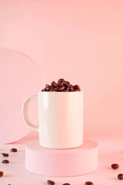 stock image Cup of Coffee on a pedestal, copy space, Raw Beans, Front View, Vertical