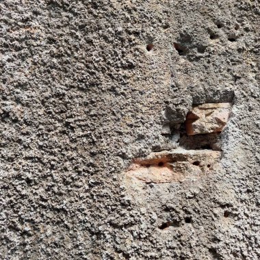 Bitmemiş duvardaki kum dokusu