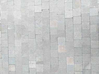 Beton tuğlaların zemin desenlerinin soyut görüntüsü. Yüksek açıyla ateş edilmiş..