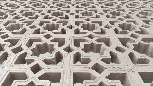 İslam 'ın ilham kaynağı yıldızların şeklindeki somut desen. Kültürel ve mimari temalı arkaplan, dekorasyon ve tasarımlar için uygundur.