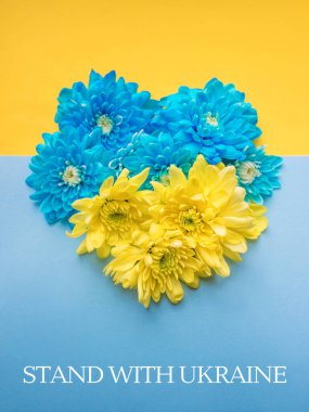 Stand with Ukraine written on Blue and yellow background. 