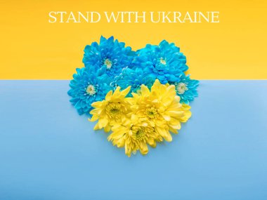 Stand with Ukraine written on Blue and yellow background. 