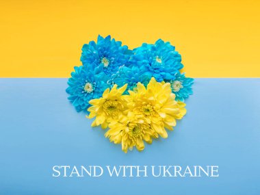 Stand with Ukraine written on Blue and yellow background. 