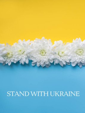 Stand with Ukraine written on Blue and yellow background. 