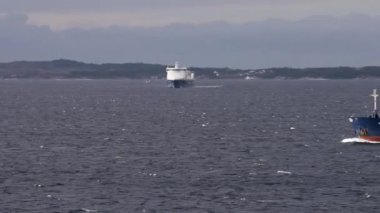 Mountains and the sea, Norway, Panoramic view, High quality 4k footage, Beautiful landscape with boats and sea, sunrise in arctic sea and mountain in horizon, Sea tropical landscape and fjords