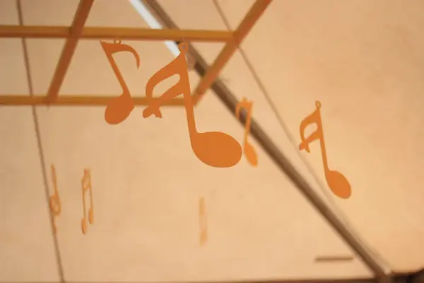 accessories of musical symbols hanging from the ceiling