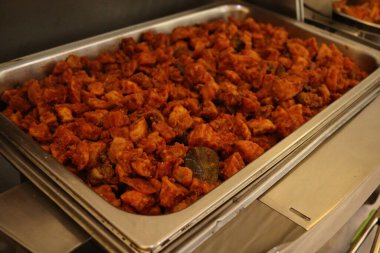 Sambal Goreng Ati is made from fried potatoes, red chili, liver on a tray