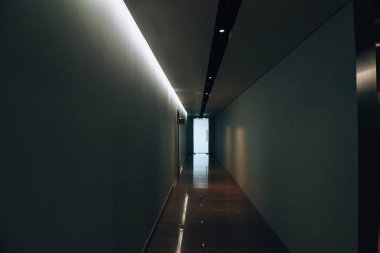 Empty long passageway in modern building