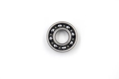 Close-up bearings spare part of mechanical on the white background. clipart