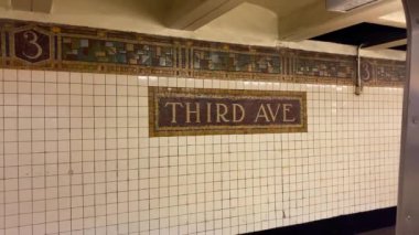 This video shows a subway station stop in New York City.