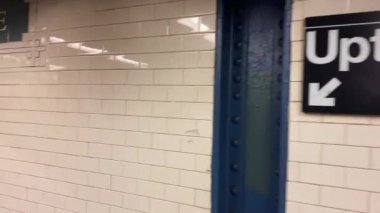 This video shows views of people wearing a face mask during the Coronavirus era on a subway train while heading from Brooklyn to downtown Manhattan.