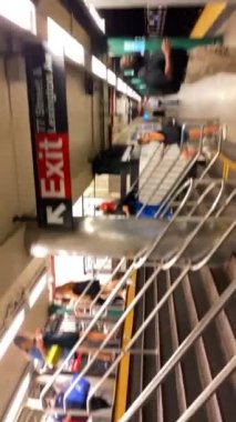 This video shows a subway station stop in New York City.