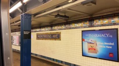 This video shows a subway station stop in New York City.