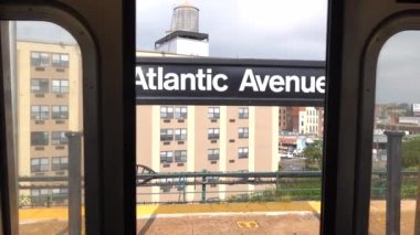 This video shows a subway station stop in New York City.