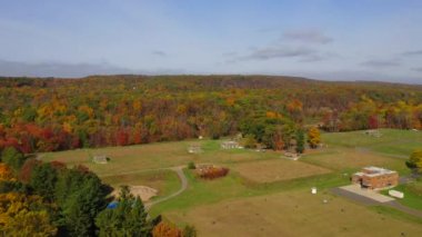 This morning time video shows gorgeous aerial views of low-altitude clouds in the middle of the countryside.  