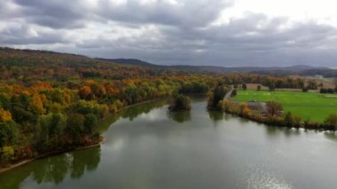 This morning time video shows gorgeous aerial views of low-altitude clouds in the middle of the countryside.  