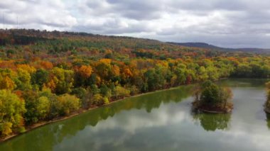 This morning time video shows gorgeous aerial views of low-altitude clouds in the middle of the countryside.  