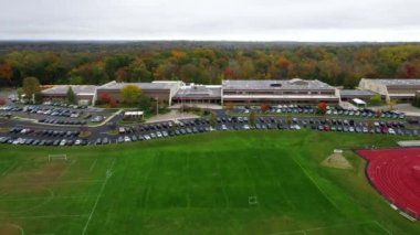 This video shows aerial views of New Canaan High School in New Canaan, CT.  New Canaan High School is the only public high school in New Canaan, Connecticut and was ranked one of the best high schools in the state.