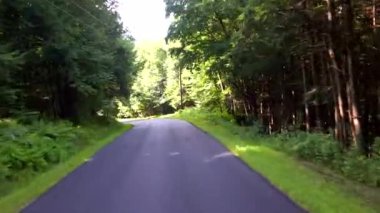 This is a beautiful view of a country road.