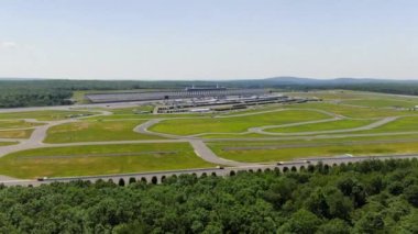 This video shows views of go-kart racing at the Pocono Raceway. 