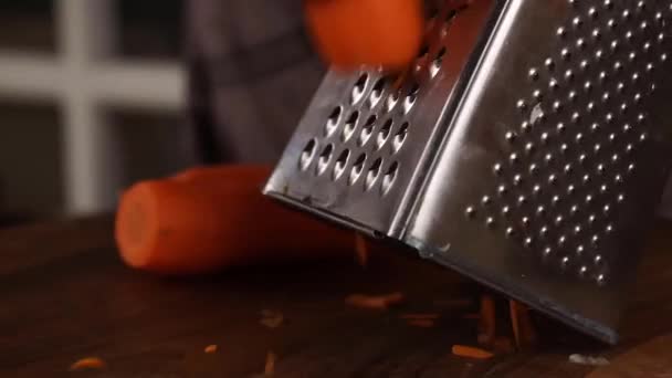 Female Cook Grates Carrots Grinding Carrots Grater Close — Stockvideo