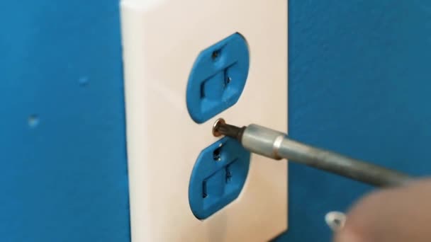 Young Female Electrician Screws Electrical Outlet Wall Screwdriver Home — Videoclip de stoc