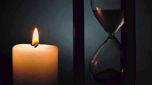 Hourglass Burning Candle Conception Time Very Little Grains Sand Fall — Stock Video