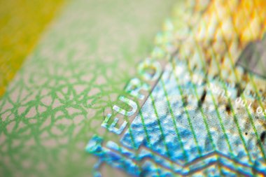 100 Euro 'luk banknot. Avro parası makro yakın plan. Avrupa Birliği 'nin Avro nakitinin yüz avro değerinde bireysel ayrıntıları. Finansal özgürlük kavramı için tasarruf.