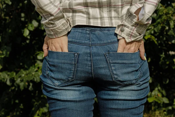 Woman Touches Her Bottom Jeans Her Hands Girl Jeans Tight —  Fotos de Stock