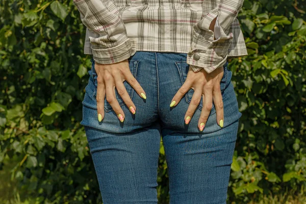 Woman Touches Her Bottom Jeans Her Hands Girl Jeans Tight — стокове фото