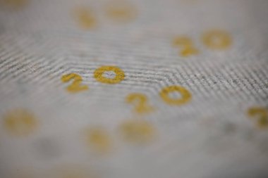 20 kağıt para makrosu. 20 dolarlık banknot için Super Macro. Finansal Zenginlik: Bankacılık ve Yatırımda Sermaye ve Kâr. Para birimi ve harflerle sembolize edilen mali büyüme.