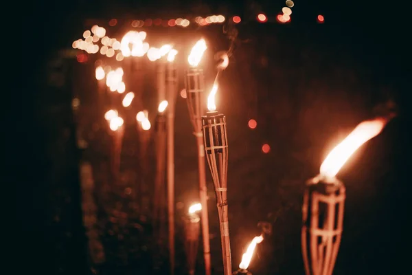Glowing Bonfire Illuminates the Night with Radiant Heat. A bright bonfire illuminates the darkness at night.