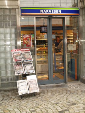 narvesen kiosk in city on background