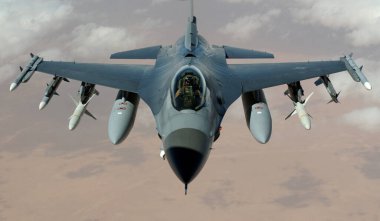 F-16 Fighting Falcon flying in the sky clipart