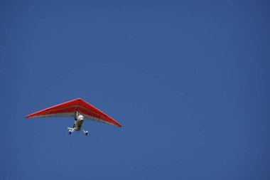 hang-glider in blue sky 