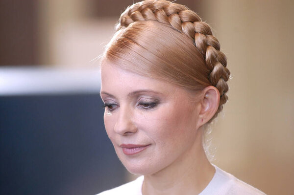 Yuliya Tymoshenko woman at event on background, close up