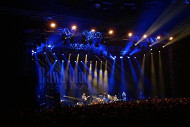 Rawa Blues Festivali - En büyük blues festivali kapalı mekanda. Uluslararası Blues festivalinin 29 'uncu baskısı. 10 Ekim 2009, Katowice, Polonya. Festivalin yıldızları: Eden Brent, Rod Piazza ve The Mighty Flyers, Eric Sardinas, Shakin Dudi