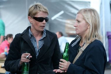 women in the pub drinking beer