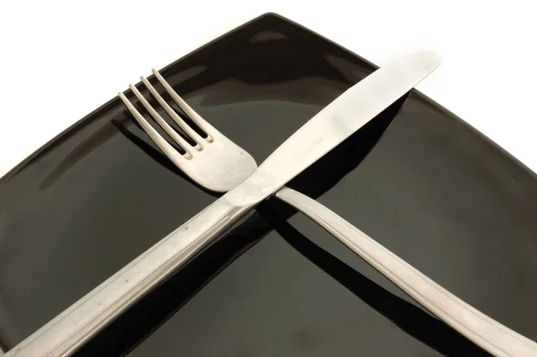 Knife Fork Black Plate White Background — Stock Photo, Image