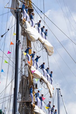 Day Time Shot Of Sail Amsterdam 2010 - Sail-in Parade clipart