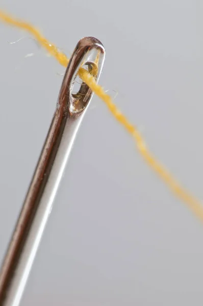Yellow Cotton Thread Needle Eye — Stock Photo, Image