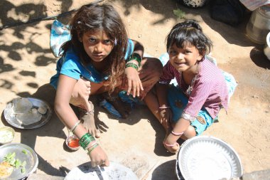 Indian children preparing lunch