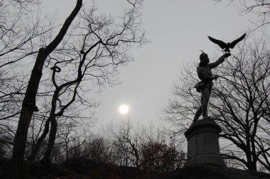 statue of The Falconer, Central Park, New York city clipart