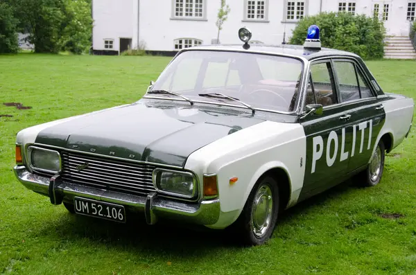 old police car outdoors