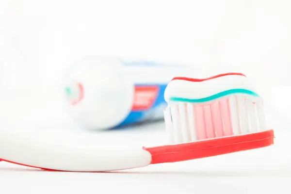 Red Toothbrush Toothpaste — Stock Photo, Image