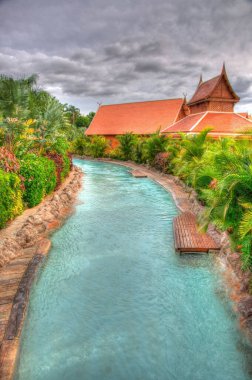 River in the park with palms, Tenerife, Canarian Islands clipart