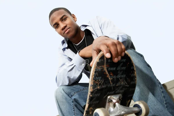Low Angle Portrait Young African American Man Sitting Skateboard Sky — Stock Photo, Image