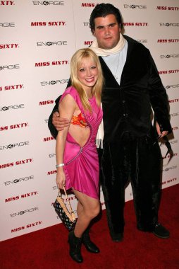 Jason Davis ve Courtney Peldon, Bayan Altılık Moda Haftası Partisi sırasında. Los Angeles, Kaliforniya, ABD