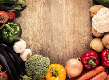 Vegetables on wood background. Organic food.